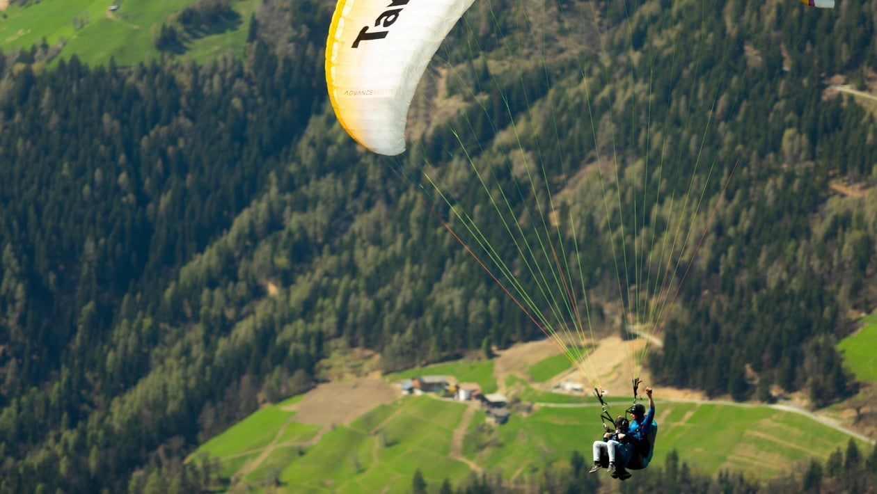 Paragliding over the peaks, true freedom